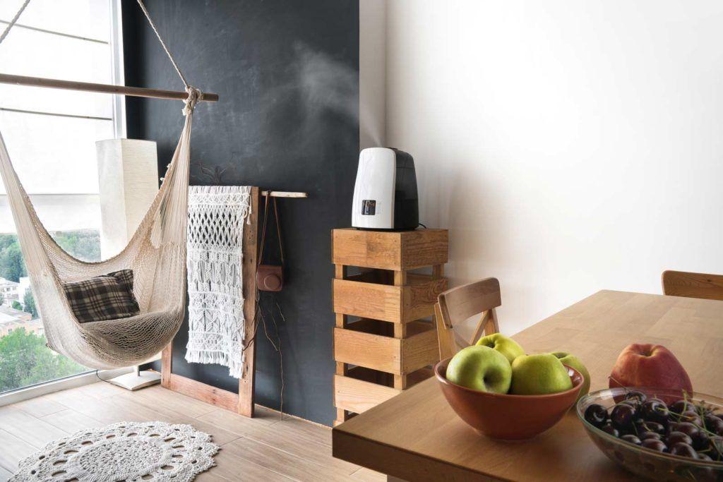 Portable room humidifier in a living room